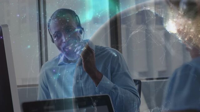 Call center rep receiving incoming call, adjusting headset, speaking while globe overlay growing