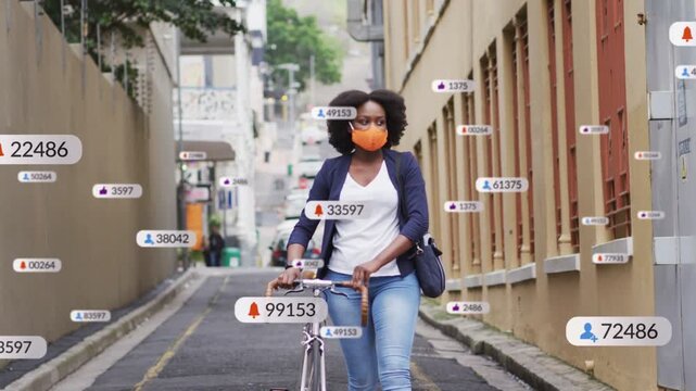 Cyclist walking bike down urban lane, movement initiating tech badges appearing and showing updates