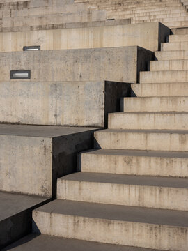 Modern concrete staircase with integrated lighting and brutalist