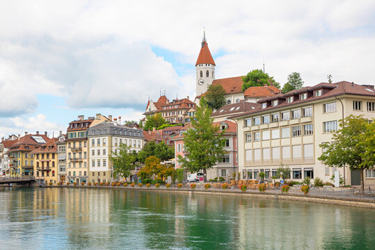 old town of tourist resort Thun, riverside Aare river, destination switzerland