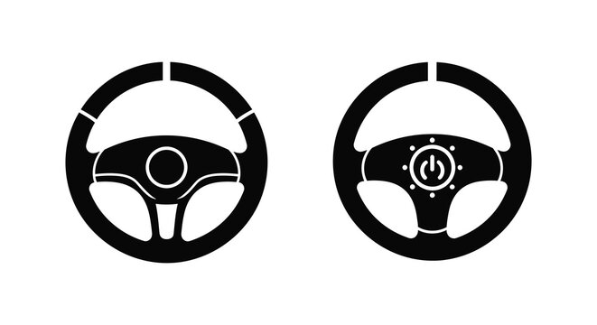 Two black steering wheels depicted as a stark silhouette