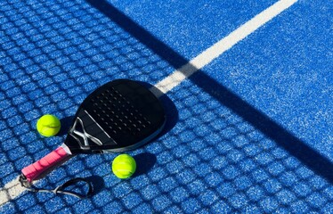 Obraz premium Padel tennis racket sport court and balls.