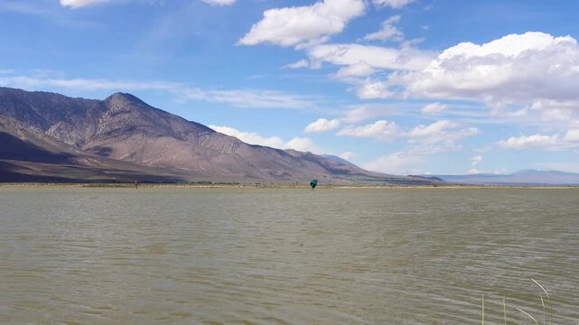 kite surfing on Klondike lake in the Owens Valley with the Sierra Nevada mountains in the background.