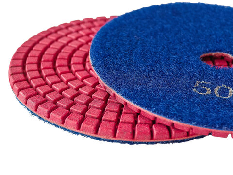 Macro of diamond abrasive disc grit 50. Professional abrasive tool detail showing grinding segments and velcro attachment

