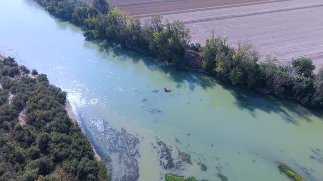 Gallur village, Ribera Alta del Ebro region, Zaragoza province, Aragon, Spain, Europe, 17 October 2025: Aerial view from a drone of the confluence of the Arba and Ebro rivers