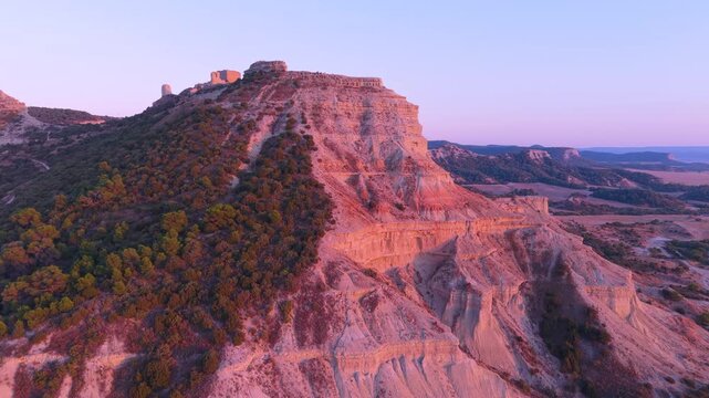 Castejon de Valdejasa village, Cinco Villas region, Zaragoza province, Aragon, Spain, Europe, 17 octubre 2025: Aerial drone view of Sora Castle, medieval fortress ruins on a rocky hilltop, surrounded 