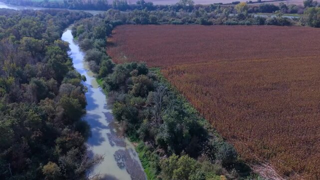 Gallur village, Ribera Alta del Ebro region, Zaragoza province, Aragon, Spain, Europe, 17 October 2025: Aerial view from a drone of the confluence of the Arba and Ebro rivers