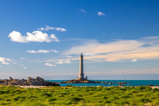 Goury lighthouse standing on rocks in La Hague, Normandy