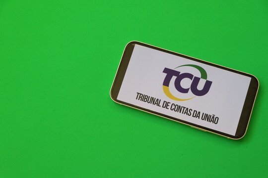 Salvador, Brazil - April 11, 2026: TCU (Tribunal de Contas da Uni&atilde;o) logo on a smartphone screen. Brazilian Federal Court of Accounts and public spending oversight. TCU logo. 