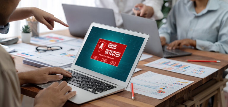 Virus warning alert on computer screen detected brisk cyber threat , hacker, computer virus and malware