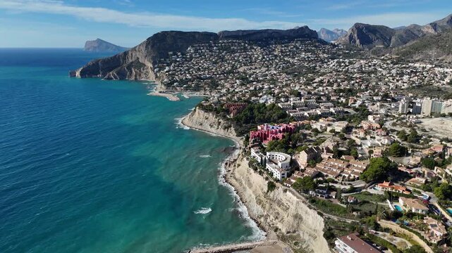 Aerial view of Calpe coastline with cliffs and houses Spain
