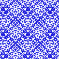 Obraz premium Seamless blue and white concentric circle pattern, reminiscent of Japanese Seigaiha waves, creating a calming, repetitive, and abstract background.