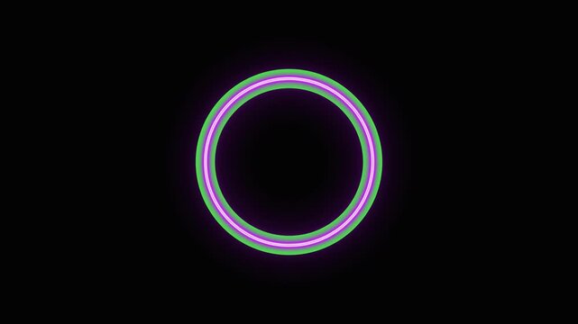 Glowing neon circle animation with green outer ring and pulsing purple inner lines on a black background, abstract technology, futuristic display, digital interface, or modern design element