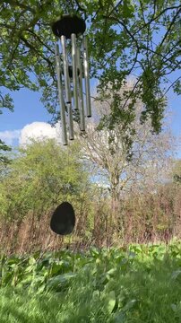 Wind chime being  blown in the wind 
