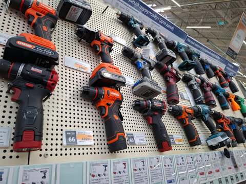 VORONEZH, Russia - April 8, 2026.Rows of cordless screwdrivers and drills from Spets, Elitech, and Makita in a home improvement store in Russia