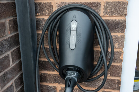 Zappi Glo Electric Vehicle Charging Point Installed on a Residential Brick Wall