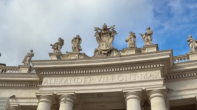Rome, Italy Panoramic view of St. Peters Square in Vatican City. Majestic colonnades, classical statues, and open sky create a historic and iconic scene.