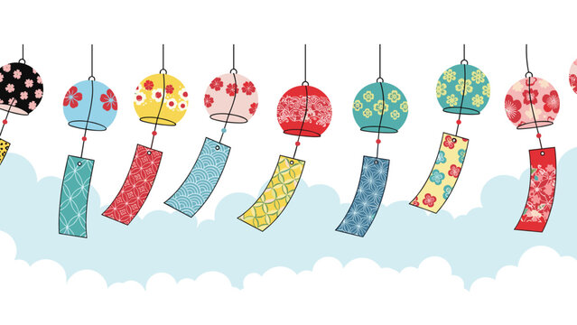 Row of vibrant Japanese glass wind bells with floral patterns and clouds in the background for summer time.