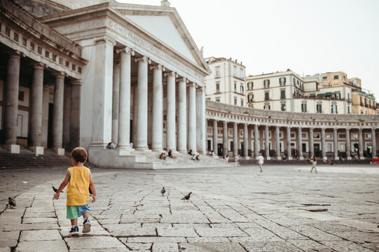 Child Running in Piazza del Plebiscito Naples Italy &mdash; Childhood Freedom in Historic Square