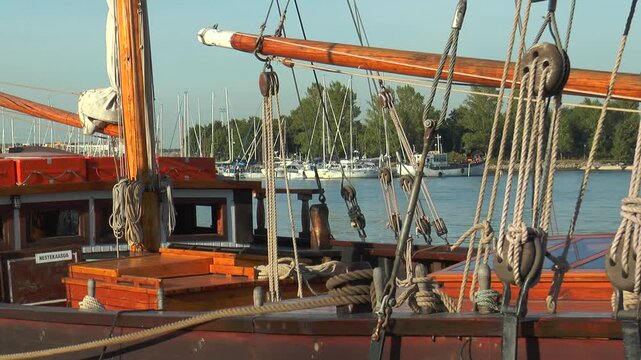 HELSINKI, FINLAND - August 6, 2013: Sailing schooner at the pier, rigging of the schooner.

Warm summer evening.