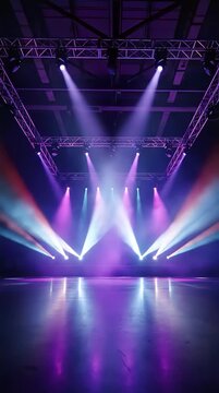 Colorful stage lighting setup with purple and white beams in empty event space.