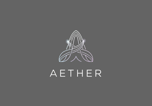 Elegant AETHER logo design with a stylized flame shape and glowing accents on a grey background, perfect for technology or creative brands