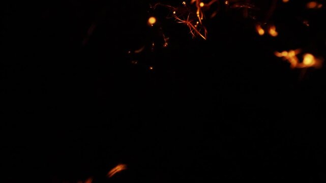 4k Slow motion shot of burning steel wool for cool transition, background and fire effects 