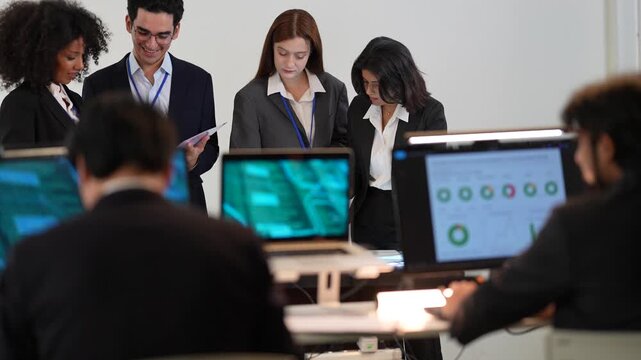 Varied background specialist group including african american woman and asian male optimizing automated trading systems and data flow in a sophisticated dark workspace hub.