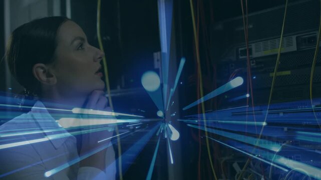 Woman tech noticing LEDs, inspecting server rack and fixing cables, blue dataflow tracing signals