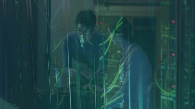 Red LED flashing, IT staff leaning, pointing, checking tablet and adjusting cables, fixing network