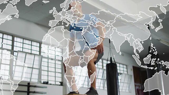 Man swinging causing box jump for fitness, landing stepping, animated map overlays as camera rises