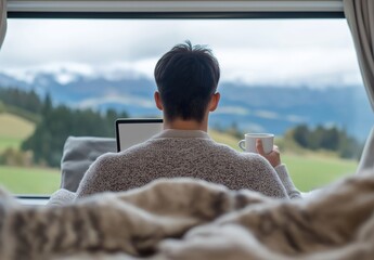 Obraz premium Man finding work-life balance, sitting with laptop and coffee, connecting with nature and global work culture