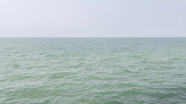 Scenic Seascape with Calm Turquoise Water and Horizon