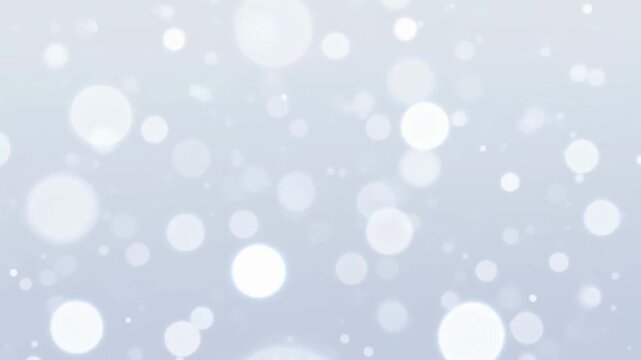 Soft focus glowing circles and particles drift gently against a pale, ethereal background, creating a serene and magical atmosphere