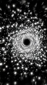 A glowing circular pattern of bright white light particles swirling against a deep black background