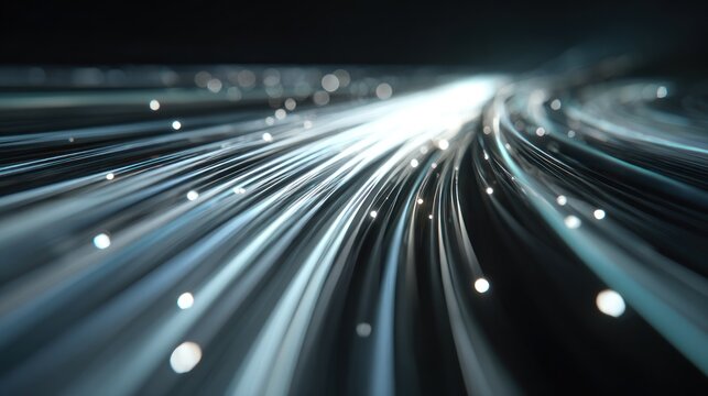 Bright light streaks flow rapidly through bundled slender conduits in darkness
