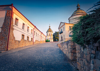 Obraz premium Superb evening scene of Basilian Monastery of Jasna Gora. Empty street on Hoshiv town, Ivano-Frankivsk region, Ukraine, Europe. Traveling concept background.