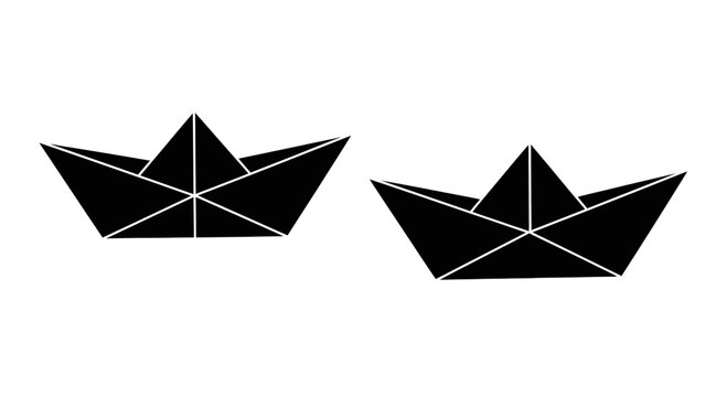 Two Black Paper Boats Floating Side by Side on White Background