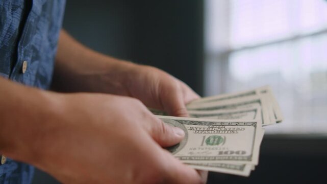 Hands meticulously sort through freshly pressed banknotes, the quiet room buzzing with energy and possibilities. Each bill promises new adventures ahead