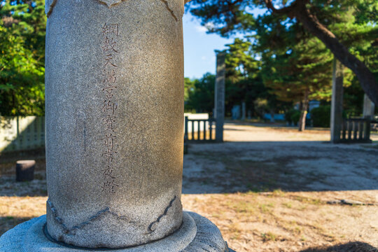 Stone lantern donated by Imari merchants at Tsunashiki Tenjin Shrine (Shin Tenjin) in Imabari, Ehime, Japan.