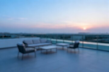 Fototapeta premium blur image of a rooftop scene with contemporary seating and open skyline, capturing tranquil evening ambiance and lifestyle concept.