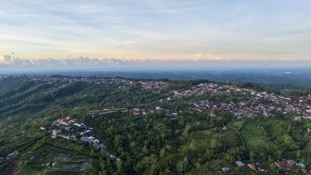 Aerial View of Kintamani Village and Lush Green Highlands in Bali at Sunset