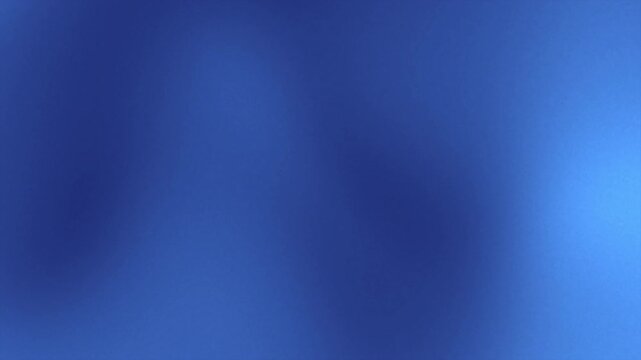 Abstract blue gradient background with smooth flowing shapes and soft light transitions. Elegant modern motion design ideal for corporate presentations, tech visuals, and digital branding