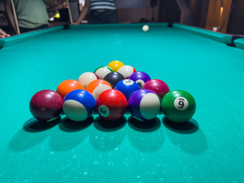 Pool table with balls.