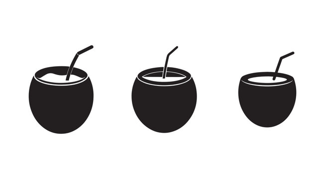 Three black coconuts with straws for drinking tropical beverages  refreshing summer drinks  exotic fruit  healthy hydration