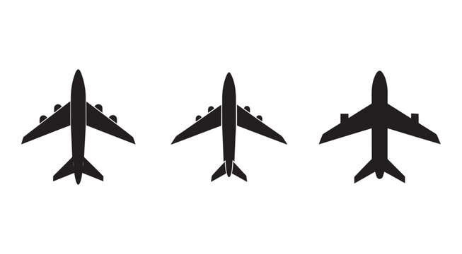 Three black silhouettes of airplanes in different positions from above  airliners in flight  commercial jets  aircraft views
