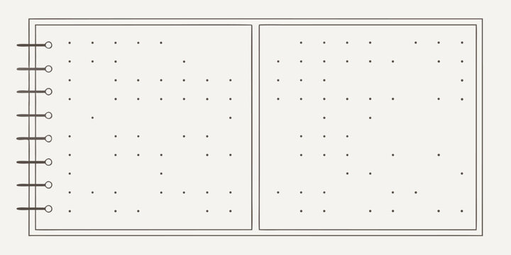 Blank bullet journal with dotted pages and spiral binding
