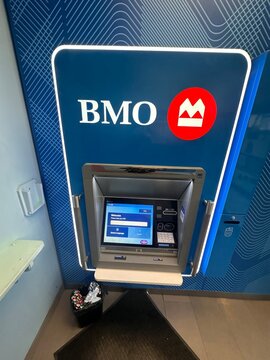 BMO Bank of Montreal ATM machine in public location showing banking service and financial transaction access. April 9 2026, Alberta, Canada. For editorial use only.