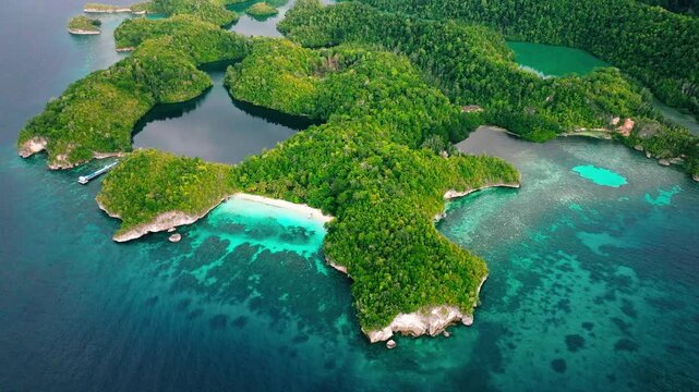 Togean Island Indonesia Stunning Drone Shot of Karina Beach and Jelly Fish Lake Turquoise Waters