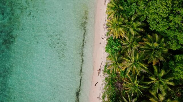 Togean Island Indonesia Stunning Karina Beach Drone Shot with Crystal Clear Ocean and White Sand
